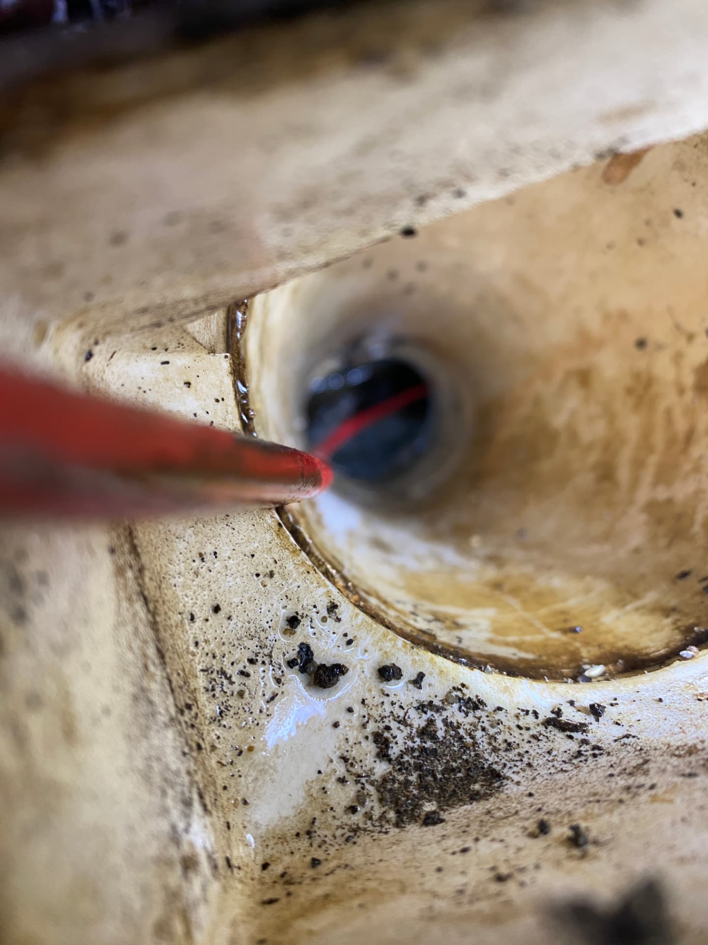 Close-up drain camera view inside a clay sewer pipe